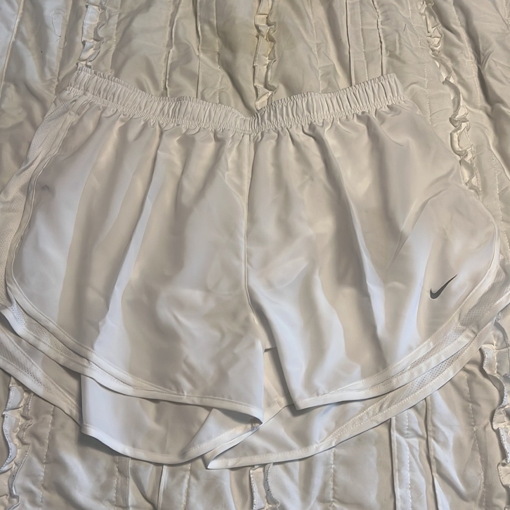white nike running shorts never worn